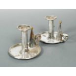 A pair of early 19th century Old Sheffield Plate chambersticks, mark of Matthew Boulton,