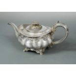 A George IV silver teapot,