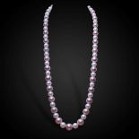 A single row opera length of Edison pink and white freshwater cultured pearls,