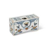 A delft miniature polychrome flower brick, possibly Wincanton, 1740,