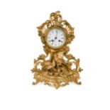 A French gilt metal and ormolu mantel clock by Henry Marc a Paris,