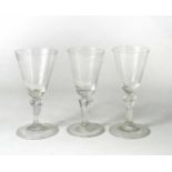 Three 18th century wine glasses,