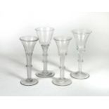 A group of four air twist wine glasses, circa 1750,