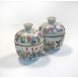 Two similar famille rose bowls and covers, late Qing Dynasty/early Republic Period,