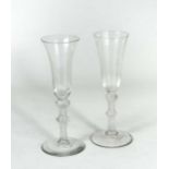 A pair of George III wine glasses,