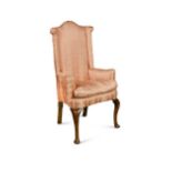 A walnut wing armchair, late 19th century,