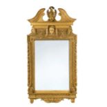 A George II and later carved giltwood wall mirror,