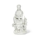 A Chinese Blanc de Chine (Dehua) figure of Guanyin, late 19th/early 20th century,