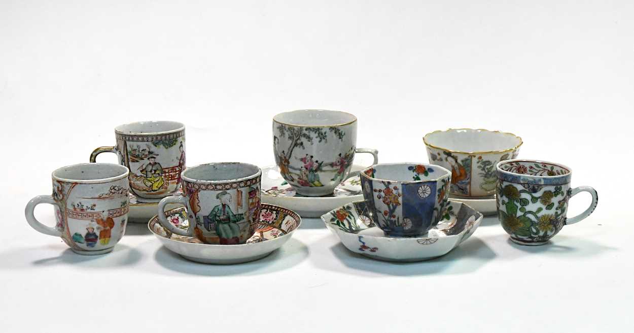 A group of five Chinese and Japanese tea and coffee cups and saucers, 18th/19th century,
