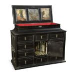 A Flemish ebony and painted table cabinet, 17th century,