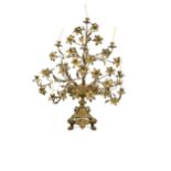 A French gilt brass nine branch candelabrum, circa 1860,
