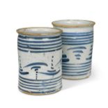 Two similar 18th century London Delft, blue and white storage jars or gallipots,