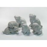 A group of five Japanese porcelain puppy and puppy groups, 19th/20th century,