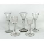 Five 18th century wine glasses,