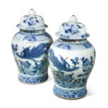 A pair of large Chinese blue and white decorated vases and covers, 20th century,