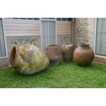 A large terracotta olive jar,