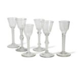 A group of six mid 18th century wine glasses,