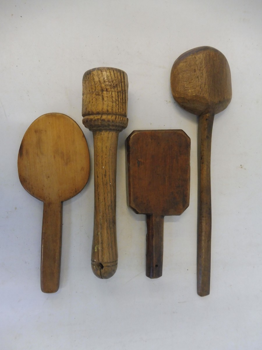 A quantity of 19th Century treen kitchen implements including a fruitwood butter stamp. - Image 2 of 2