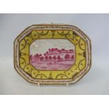 An unusual 19th Century small platter bearing a central European landscape scene in a pink tint,