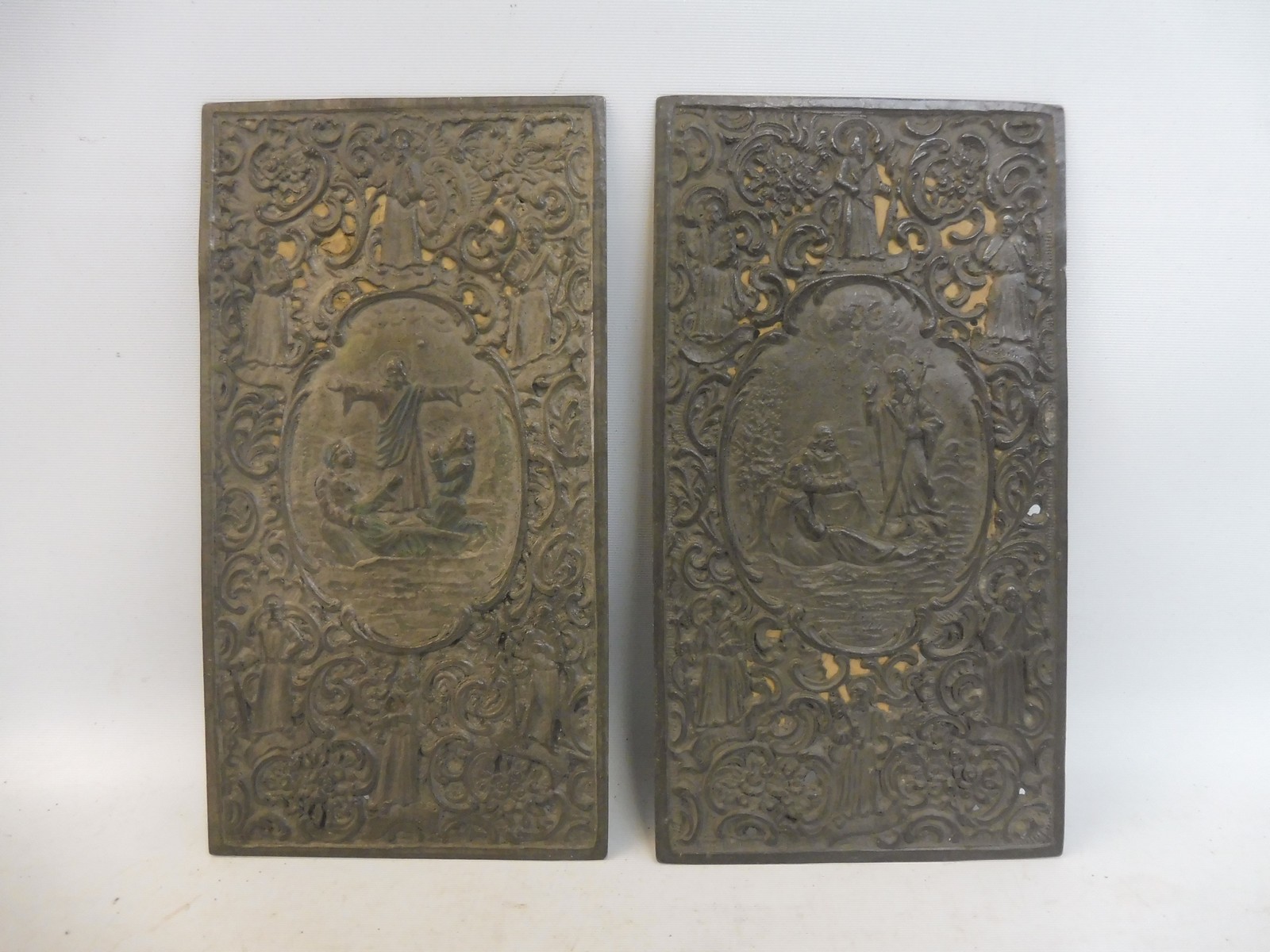 A pair of early 19th Century pierced lead relief plaques.