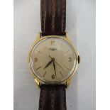 A 9ct gold Longines gentleman's wristwatch on a later leather strap.