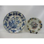 An 18th Century Delft tin glazed blue and white charger, 13 1/4" diameter, plus a small Delft