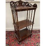 A Victorian mahogany three tier whatnot with pierced three quarter gallery and single drawer,