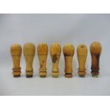 A set of seven Victorian ivory handles of good colour.