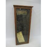 An oak framed wall mounted front opening display cabinet/notice board, lacking internal divisions,