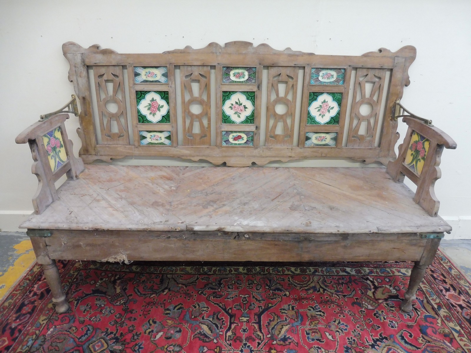 An unusual Anglo-Indian hardwood bench with detached hinged back inset with early 20th Century