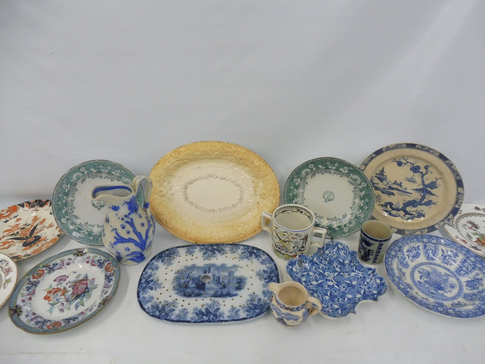 A collection of 19th Century ceramics including a bread plate.