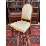 A 19th Century satinwood and upholstered side chair, raised upon octagonal tapering front supports.