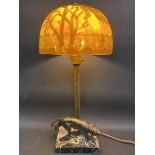 An Art Deco 1930s table lamp, the glass shade in the manner of Galle, the marble base surmounted