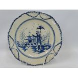 A 19th Century pearlware blue and white plate in the manner of Worcester, with a central design of