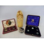 A cased partial set of silver and butterfly wing buttons, an Art Nouveau pill pot, a well detailed