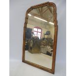 A walnut framed wall mirror, probably 18th Century, with paper label to verso for Tredegar Park,