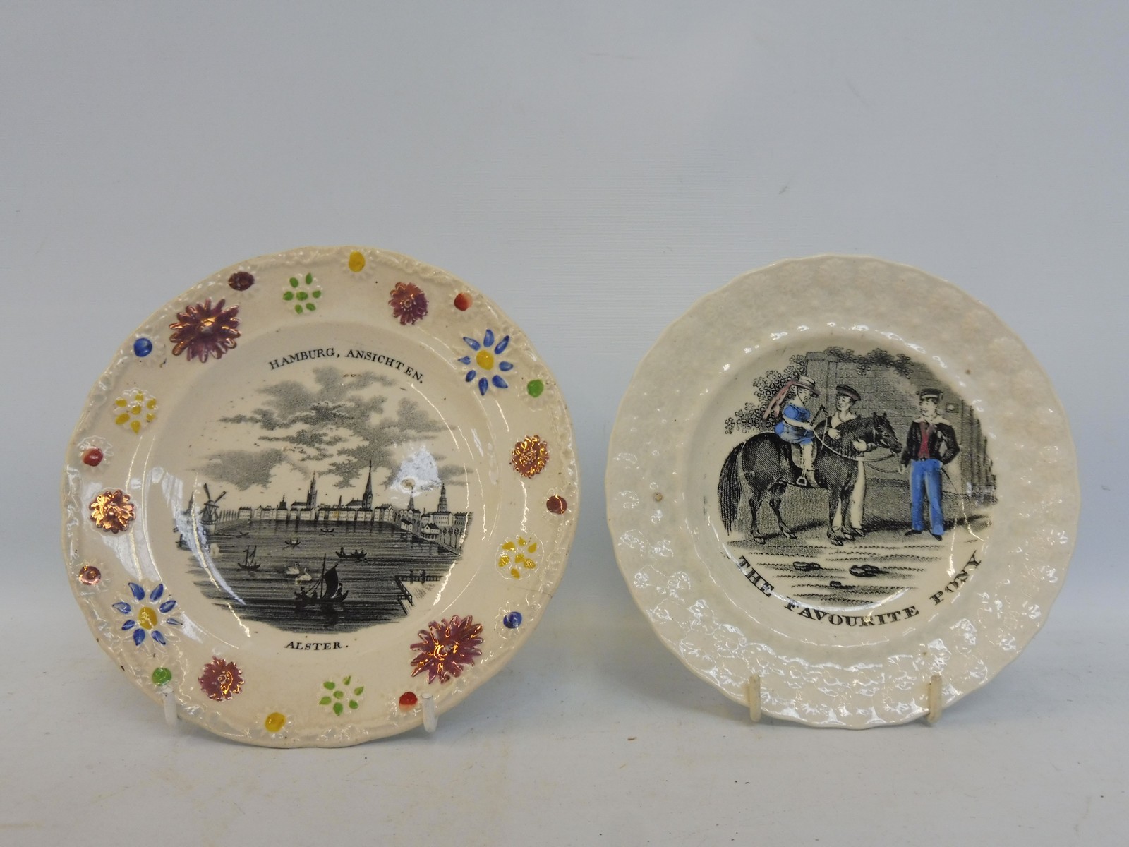 Two Victorian child's plates: The Favourite Pony and Hamburg.