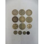 A selection of coins to include six pre-1948 silver crowns, a 1921 florin, five further pre-1948