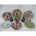 A collection of mostly 19th Century Oriental ceramics including an Imari bottle vase.