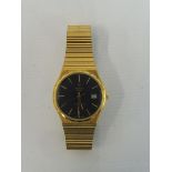 A cased Marvin Revue Quartz gold plated gents wristwatch.