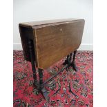 An Edwardian walnut Sutherland table, 24" w x 24" h x 6 1/2" d (flaps closed).