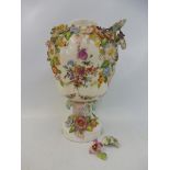 A 19th Century Continental floral encrusted vase, probably Dresden, 9" high.