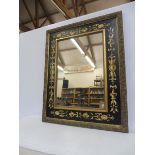 A contemporary decorative wall mirror, 32 1/2 x 41"