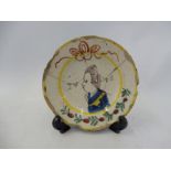 An 18th Century Delft tin glazed plate depicting William of Orange, 5" diameter.