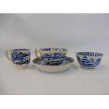 An early 19th Century blue and white tea bowl and matching saucer, possibly Worcester, an early 19th
