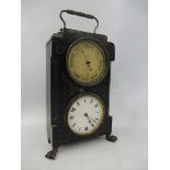 A late 19th Century clock and aneroid barometer together set within an ebonised carry case raised on