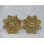 A pair of iron ceiling roses or table bases, each with a registration lozenge underneath, both
