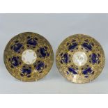 Two very similar high quality Royal Worcester cabinet plates of cobalt blue ground overlaid with