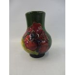 A small Moorcroft vase, impressed marks to base.