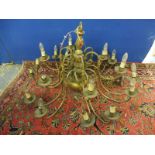 A large and impressive 15 branch brass chandelier.